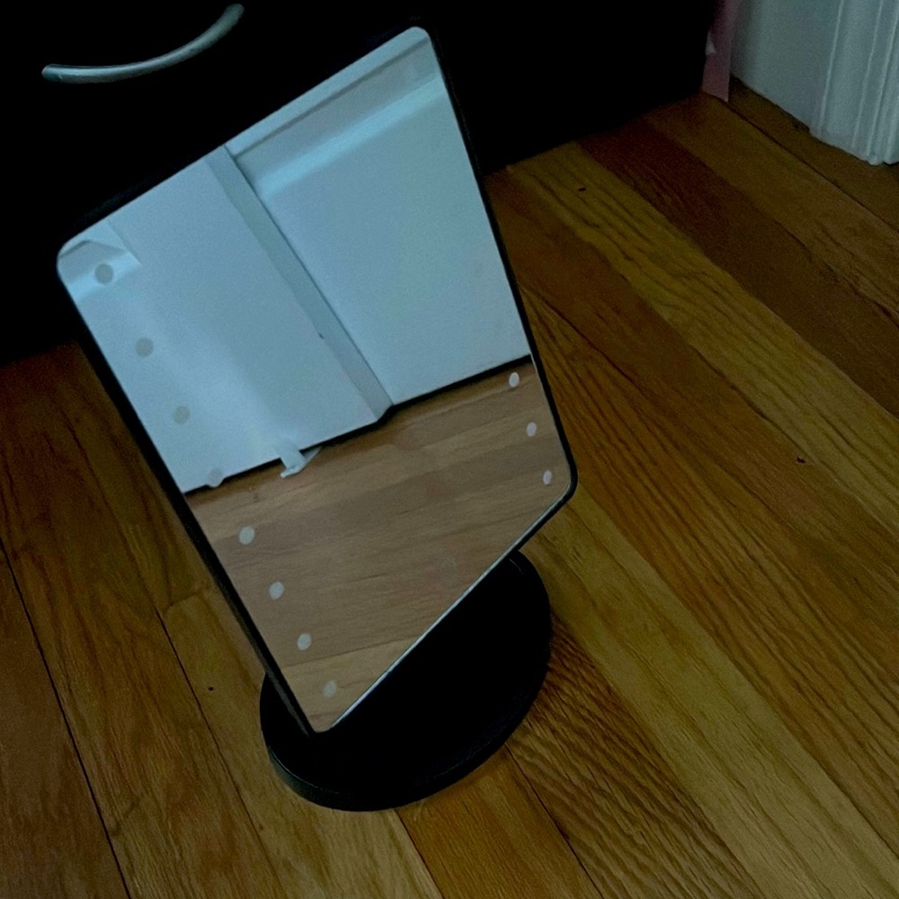 Small light up mirror